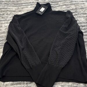 Black Turtleneck Sweater with Textured Sleeves